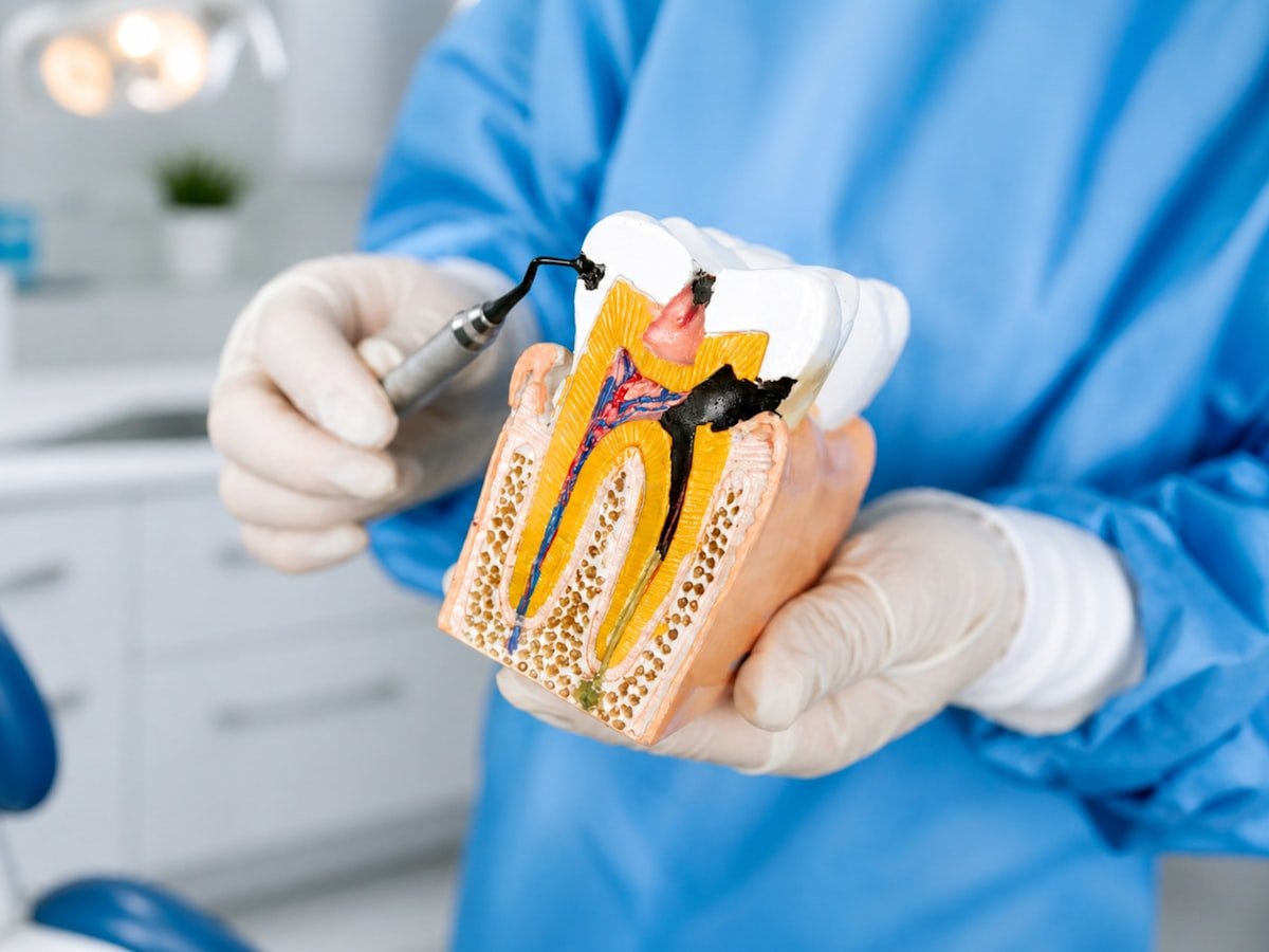 Dentist reviewing recovery plan